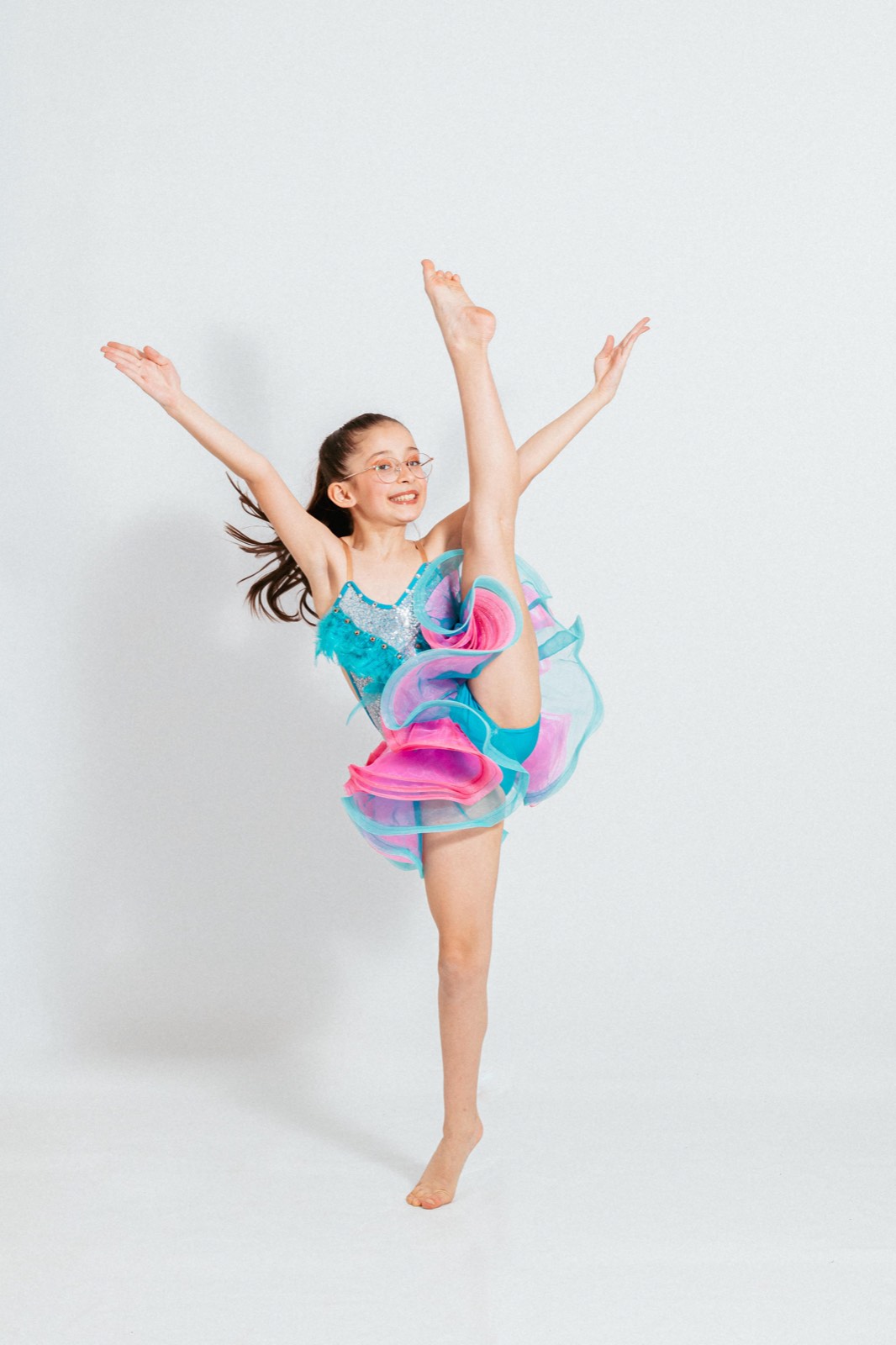 Grand jeté en costume turquoise